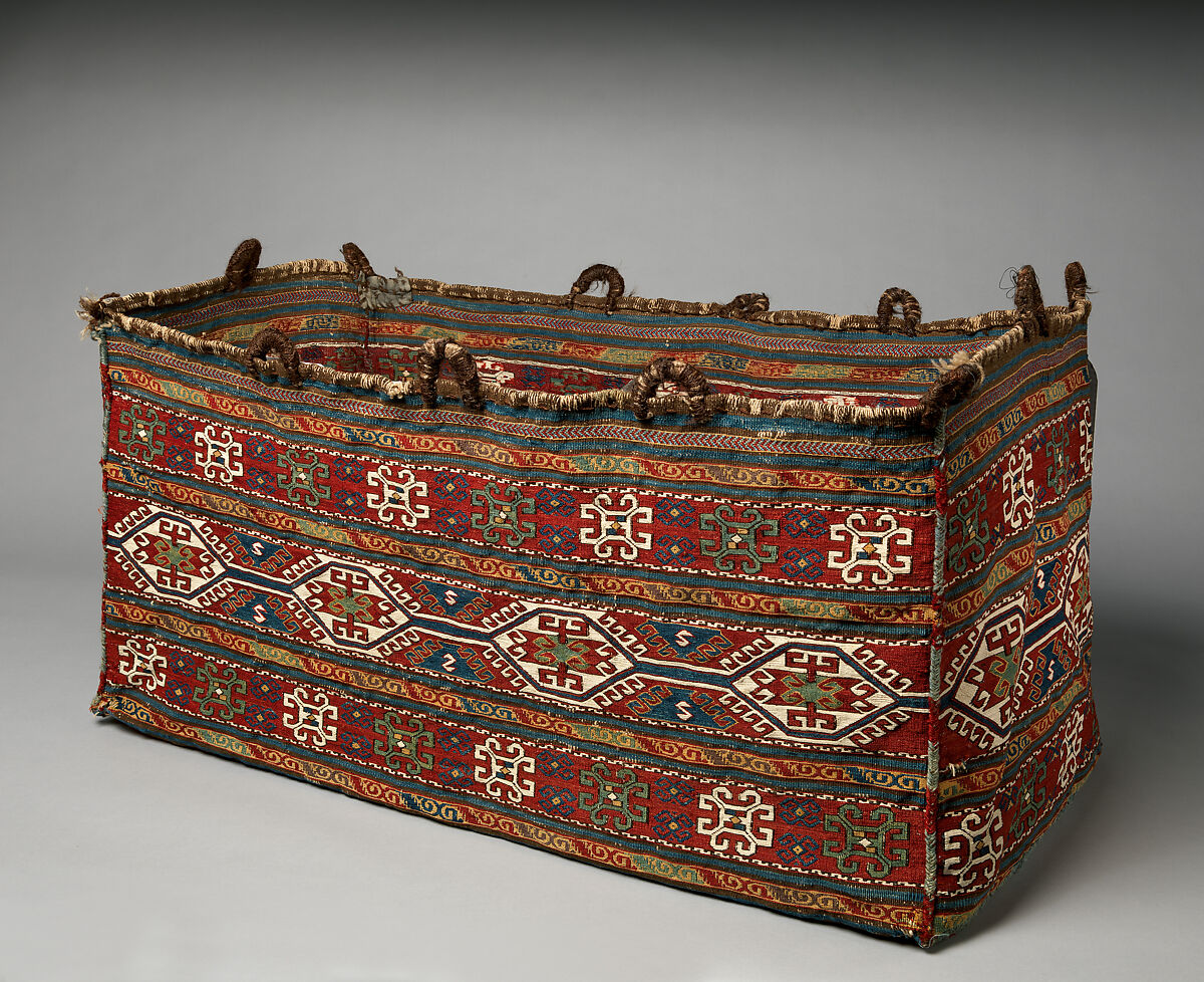 Bedding Bag, Wool (warp, ground weft, and sumak weft), cotton (white sumak weft), and goat(?) hair (loops); sumak extra-weft wrapping (sides); weft-faced plain weave (bottom and sides)