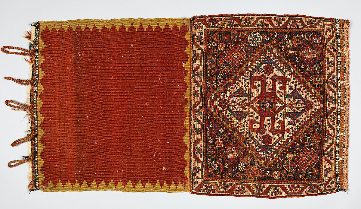 Half a Double Saddle Bag (Khorjin), Wool (warp, ground weft, and pile); asymmetrically knotted pile and closure border in complementary weft weave (front); slit tapestry (kilim) with border pattern in complementary weft weave, and twined and braided loop closures (back)