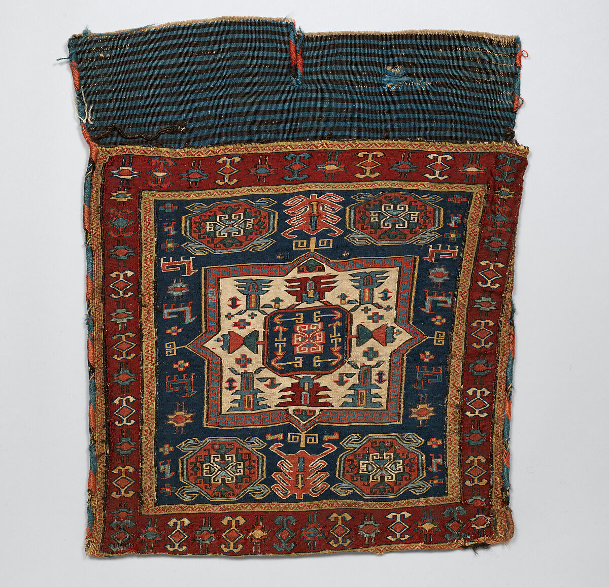 Face of Half a Double Saddle Bag (Khorjin), Wool (warp, ground weft, and sumak weft); sumak extra-weft wrapping (front); weft-faced plain weave (back) 