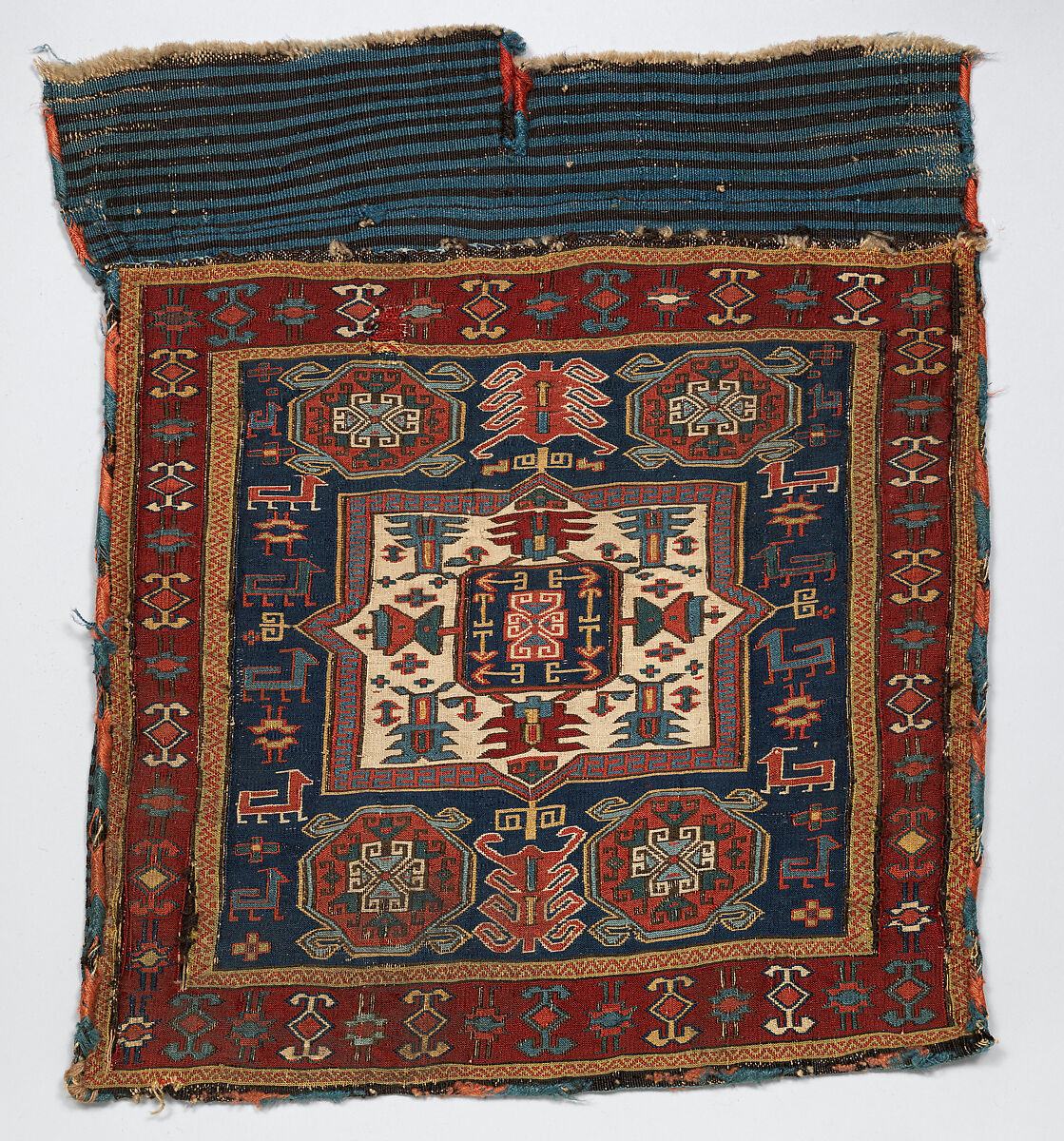 Face of half a Double Saddle Bag (Khorjin), Wool (warp, ground weft, and sumak weft); sumak extra-weft wrapping (front); weft-faced plain weave (back) 