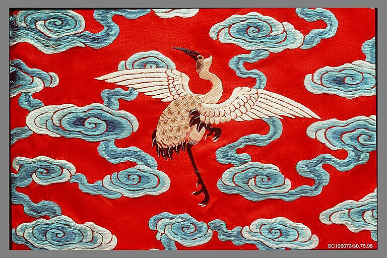 Woman’s robe decorated with cranes amid clouds, Silk embroidery on silk satin, China