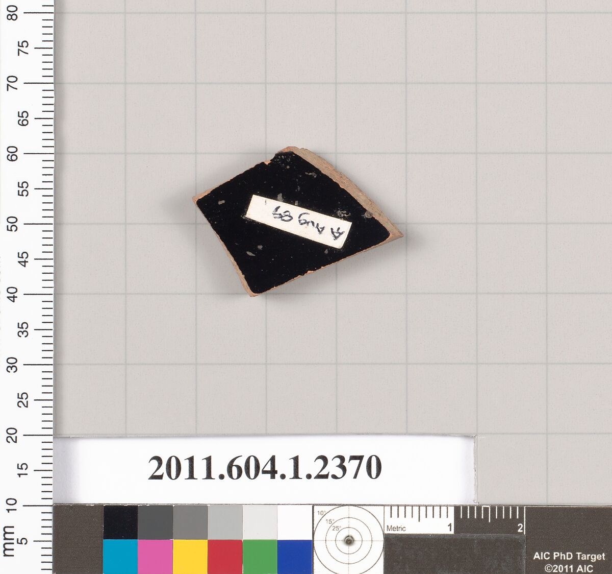 Terracotta fragment of a kylix (drinking cup), Terracotta, Greek, Attic