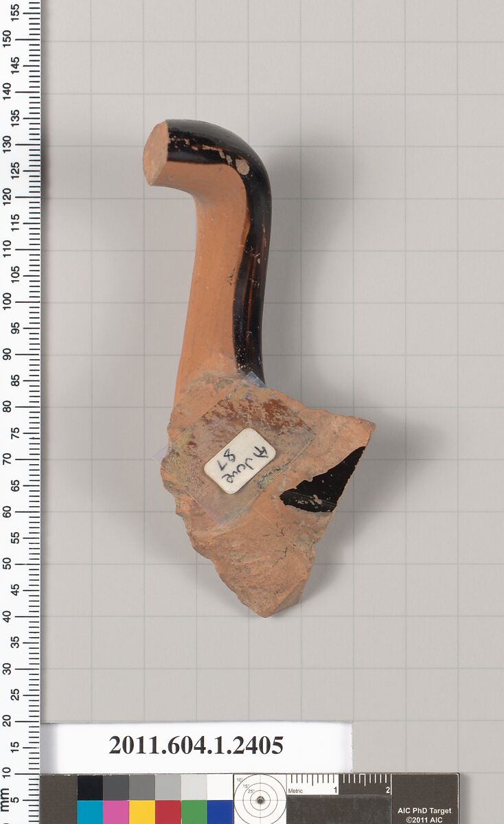 Terracotta fragment of a kylix (drinking cup), Terracotta, Greek, Attic