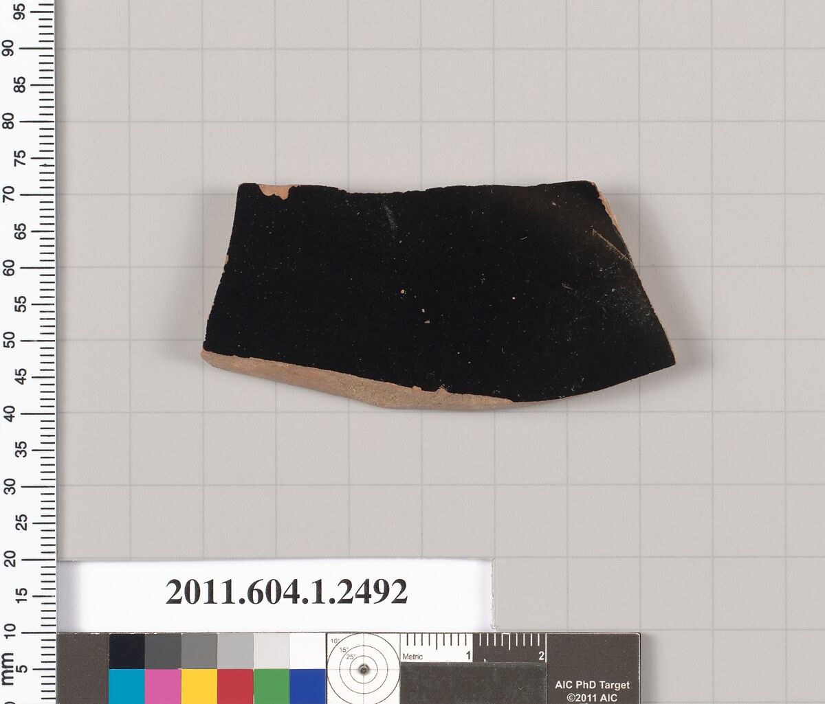 Terracotta fragment of a kylix (drinking cup), Terracotta, Greek, Attic