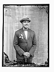 Self-portrait in bow tie and hat