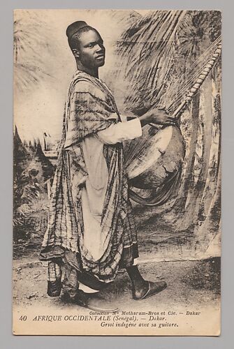 West Africa (Senegal) Dakar—Native griot with his guitar [Afrique Occidentale (Sénégal) Dakar—Griot indigène avec sa guitare]