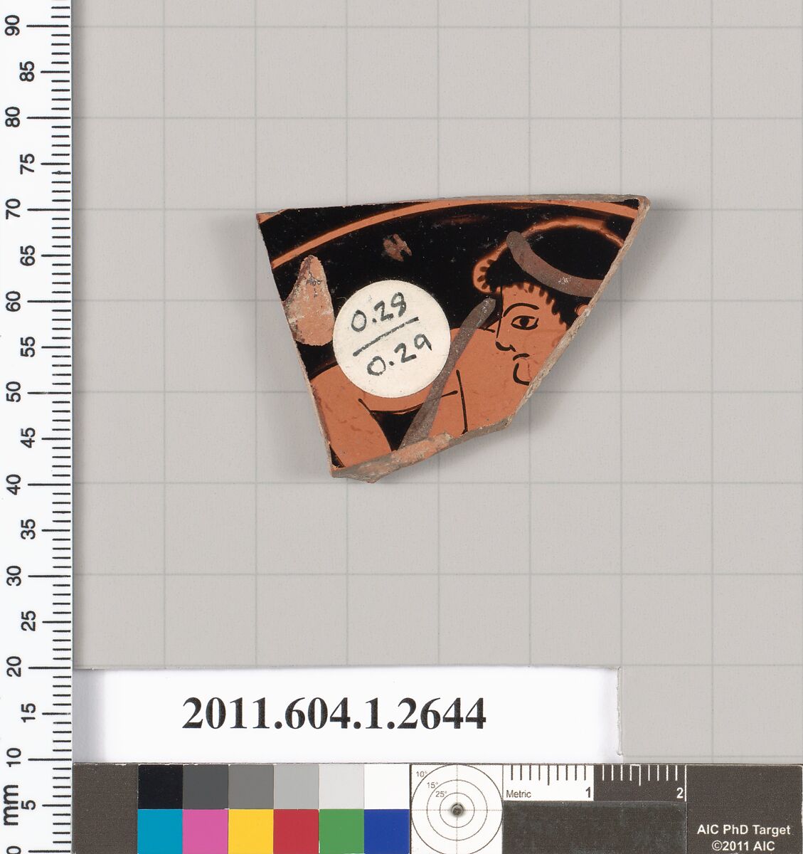 Terracotta fragment of a kylix (drinking cup), Terracotta, Greek, Attic 