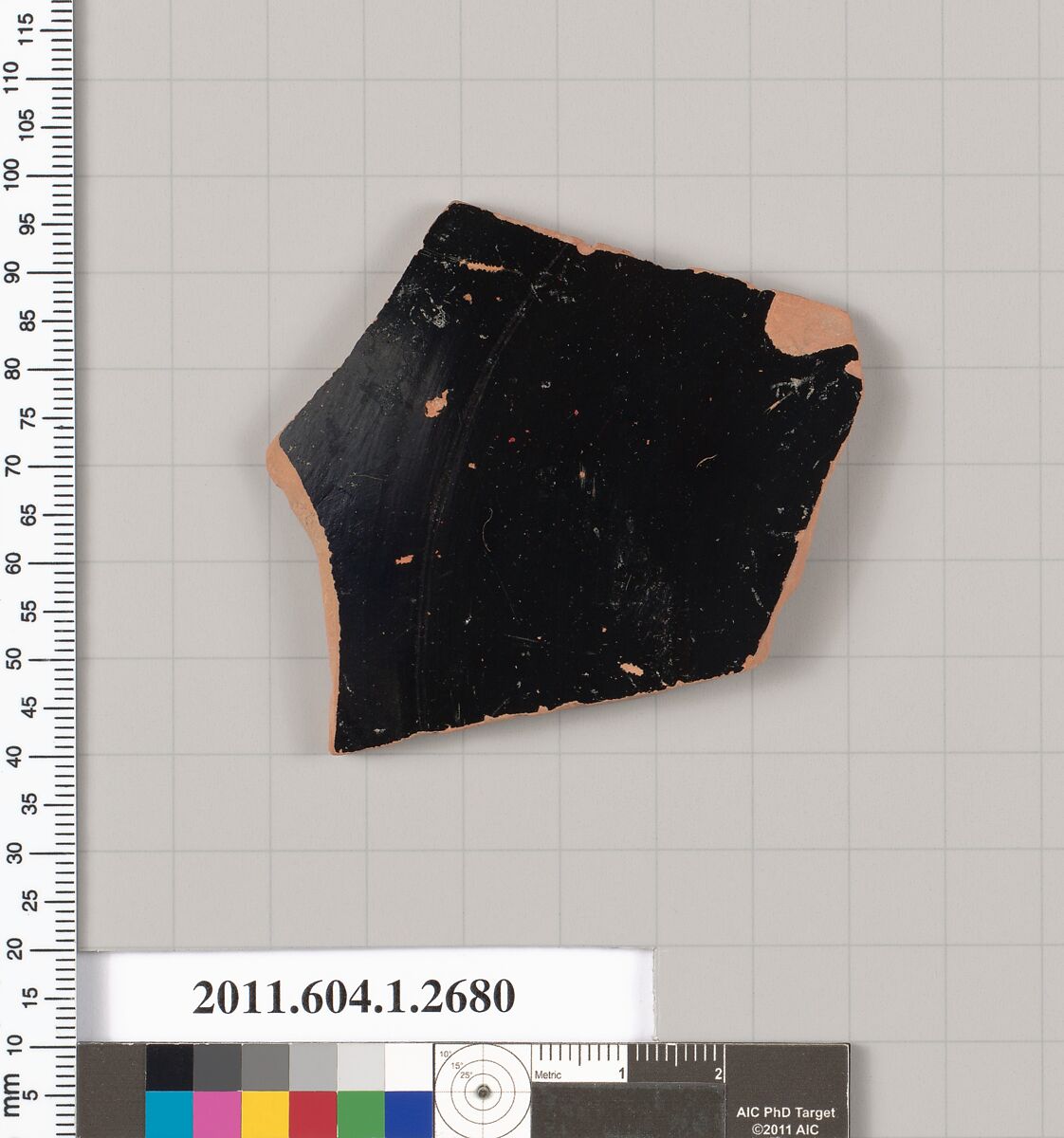 Terracotta fragment of a kylix (drinking cup), Terracotta, Greek, Attic