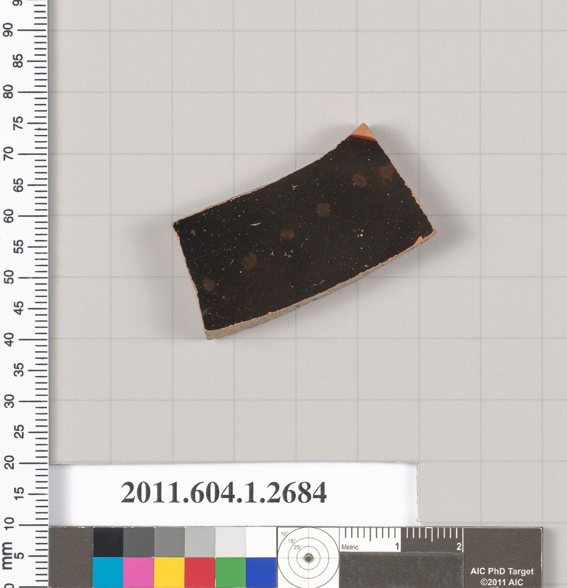 Terracotta fragment of a kylix (drinking cup), Terracotta, Greek, Attic 