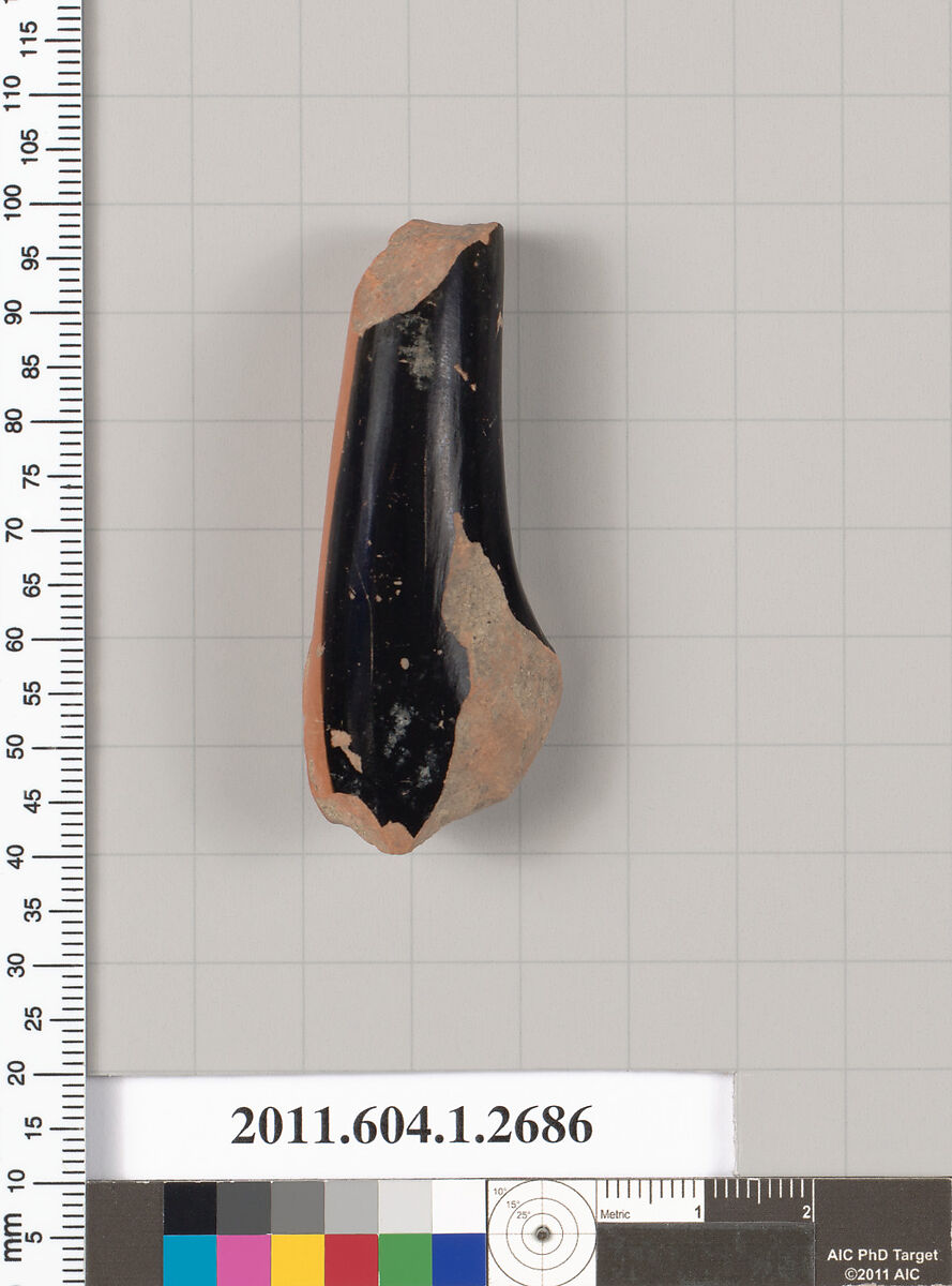 Terracotta fragment of a kylix (drinking cup), Terracotta, Greek, Attic 