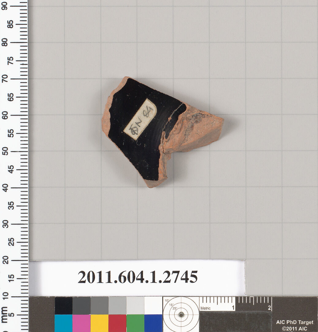 Terracotta fragment of a kylix (drinking cup), Terracotta, Greek, Attic