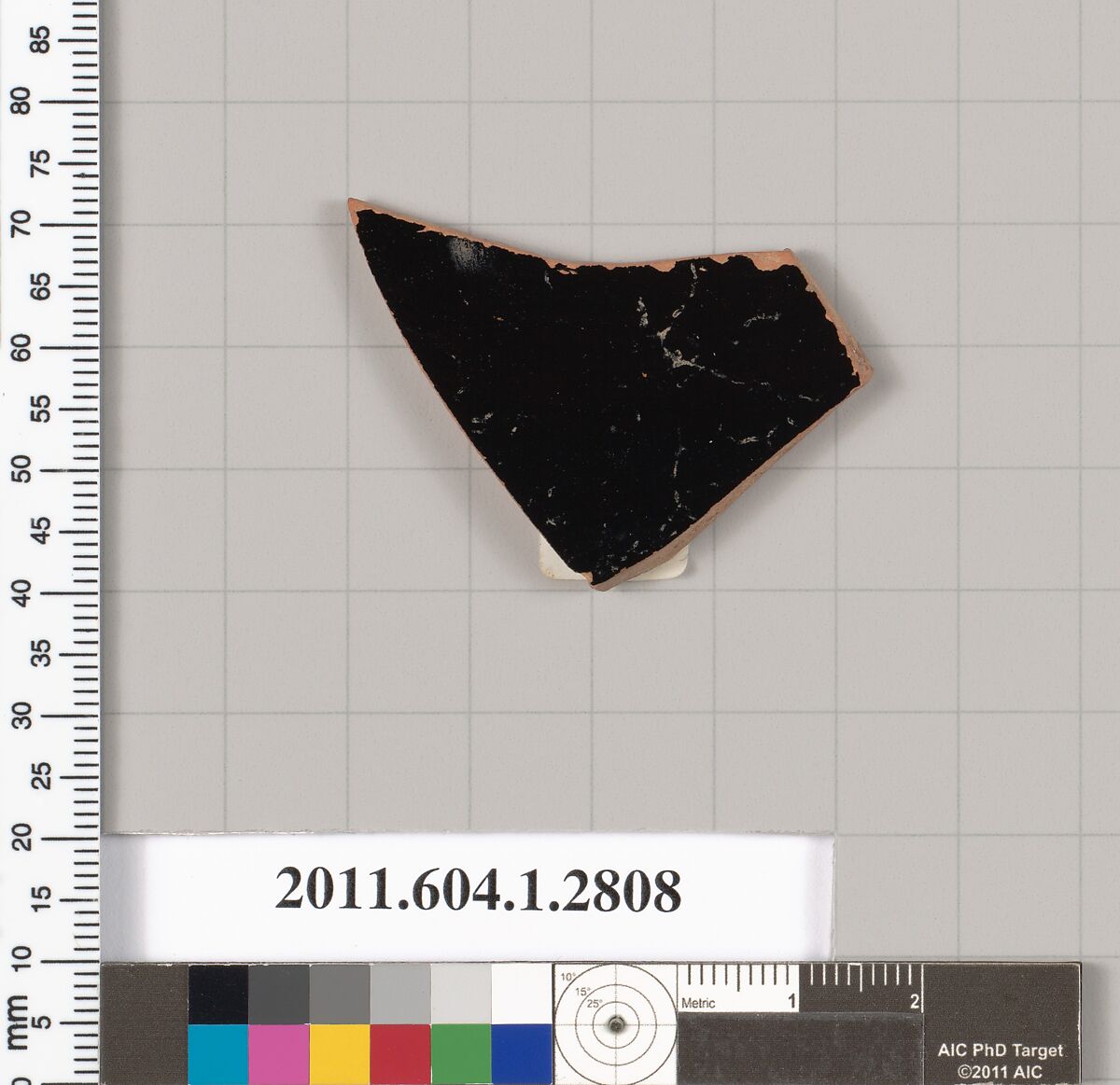 Terracotta fragment of a kylix (drinking cup), Terracotta, Greek, Attic