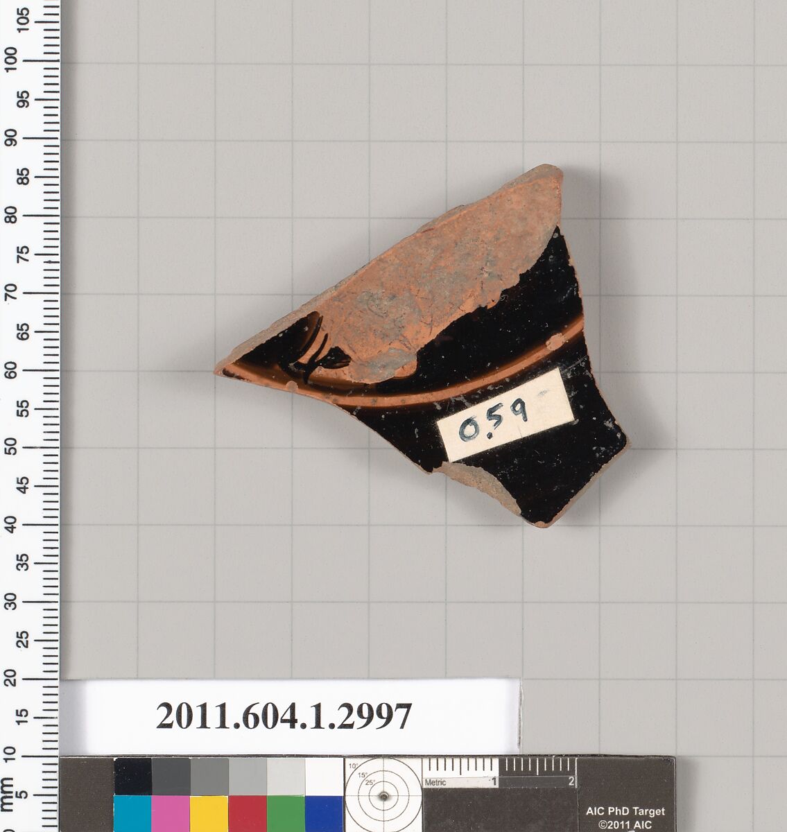 Terracotta fragment of a kylix (drinking cup), Terracotta, Greek, Attic 