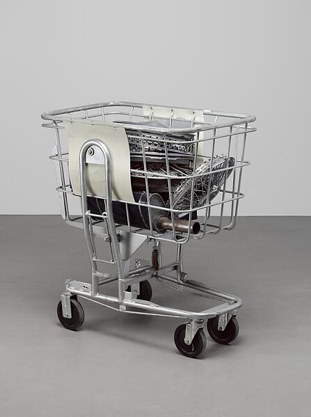 Cart Full of Action, Cady Noland (American, born Washington, D.C., 1956), Industrial cart, hubcaps, car parts 
