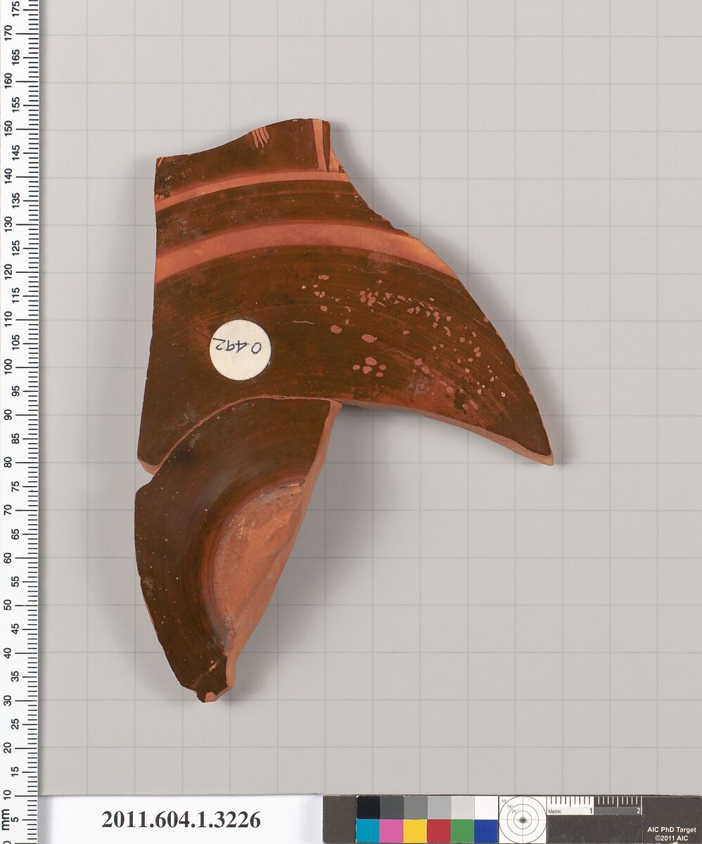 Terracotta fragment of a kylix (drinking cup), Terracotta, Greek, Attic