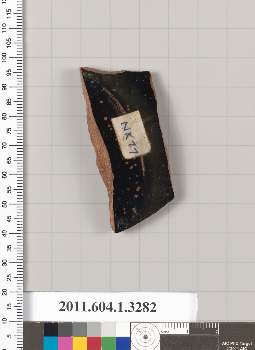 Terracotta fragment of a kylix (drinking cup), Terracotta, Greek, Attic