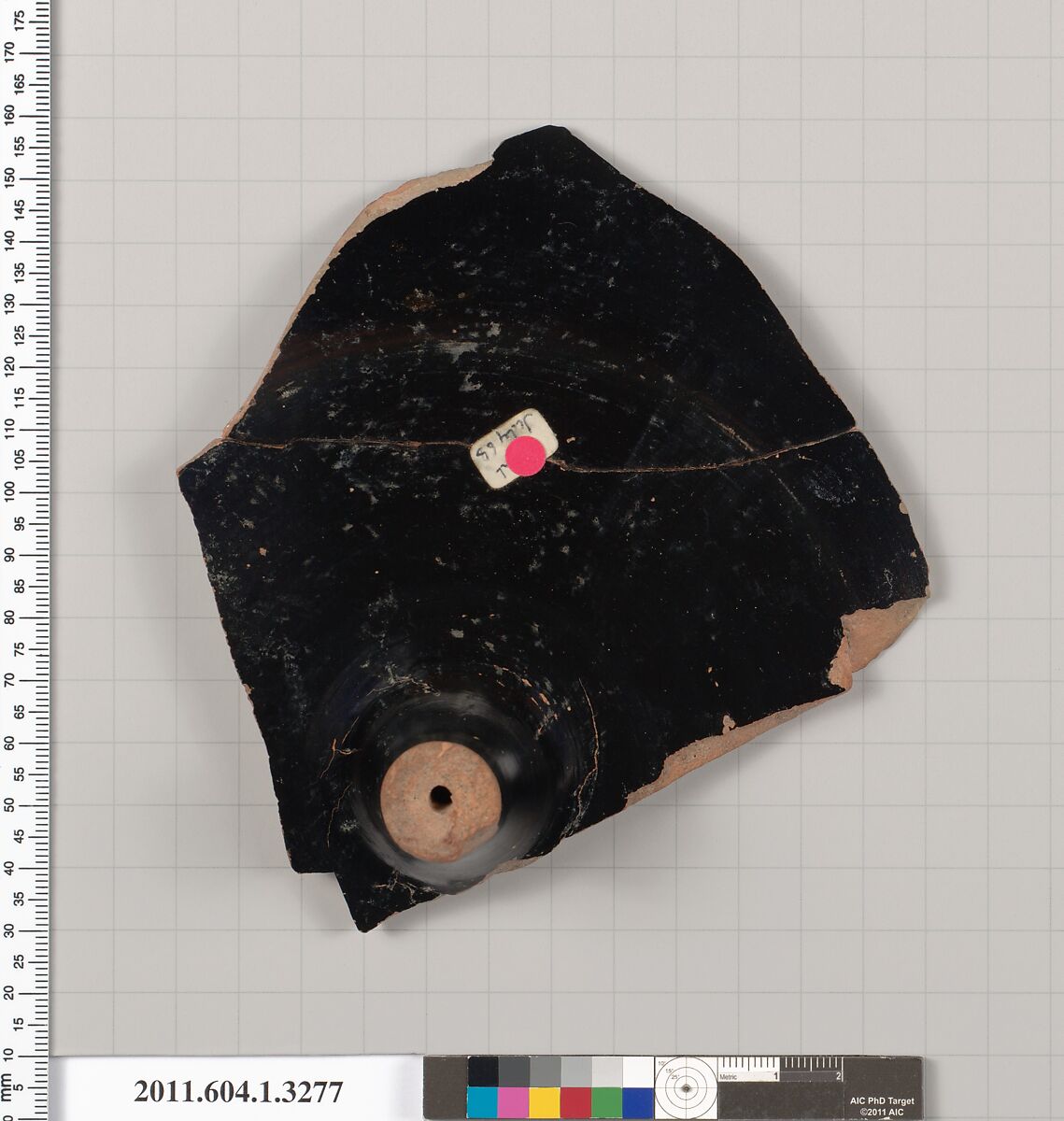 Terracotta fragment of a kylix (drinking cup), Attributed to the Tarquinia Painter, Terracotta, Greek, Attic