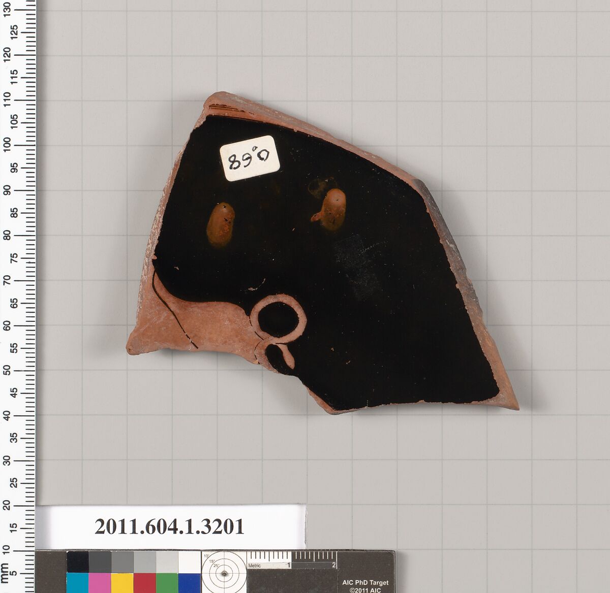 Terracotta fragment of a kylix (drinking cup), Attributed to the Poseidon Painter ? [DvB], Terracotta, Greek, Attic