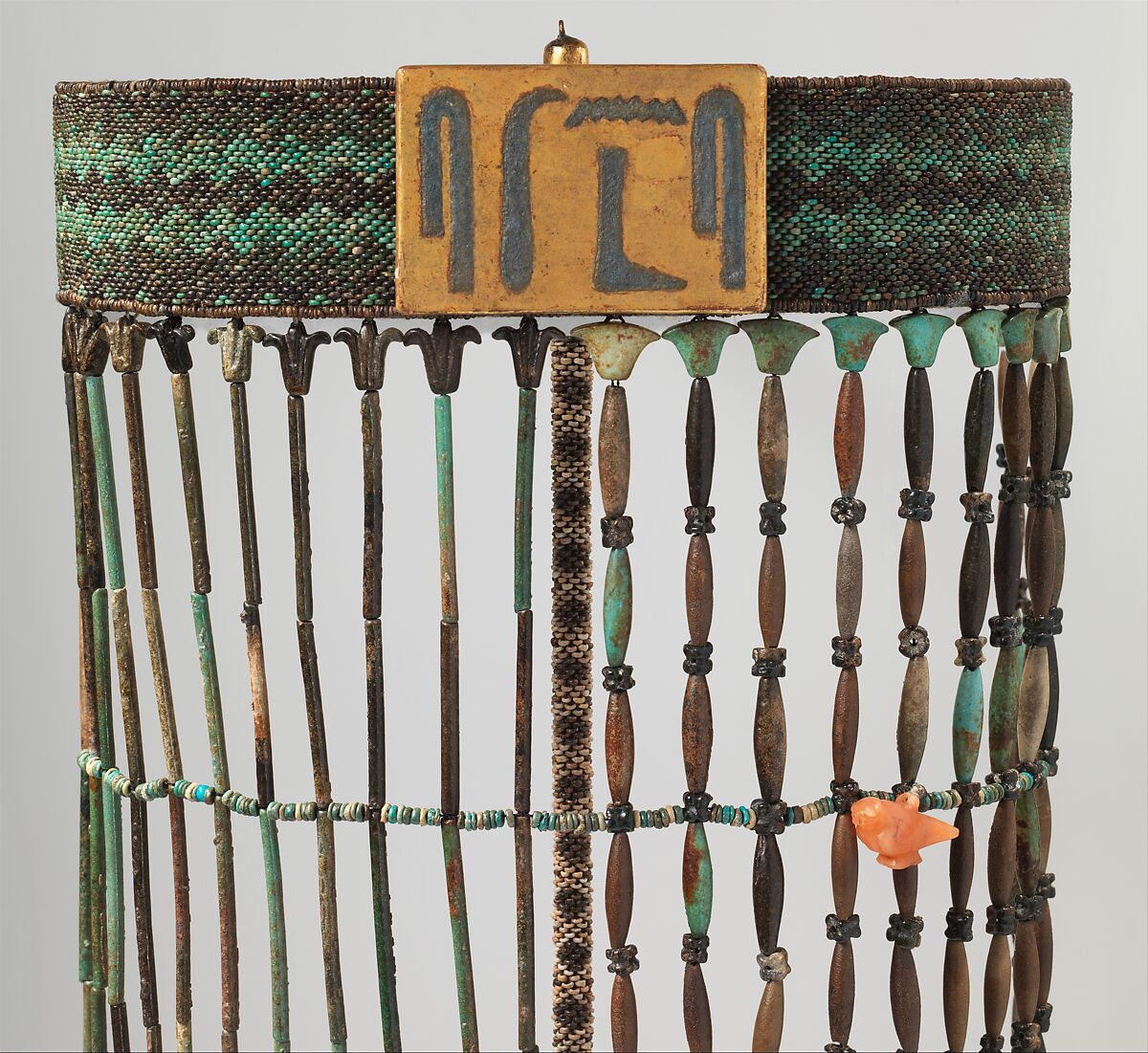Beadwork apron of Senebtisi, Light and dark green, blue and black faience, paint