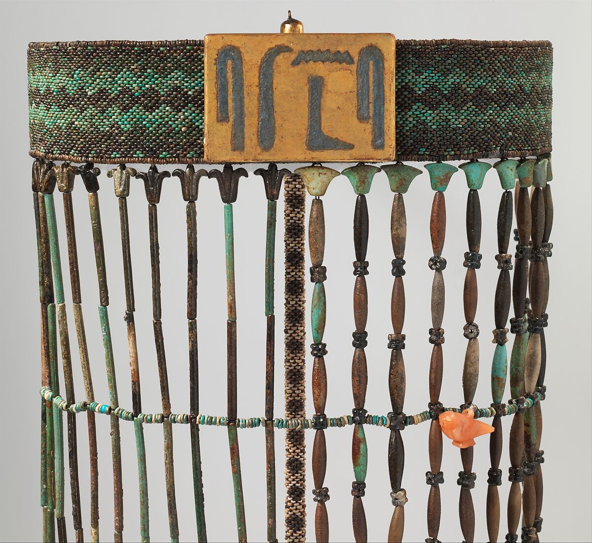 Belt of beadwork apron of Senebtisi, Light and dark green, blue and black faience, paint 