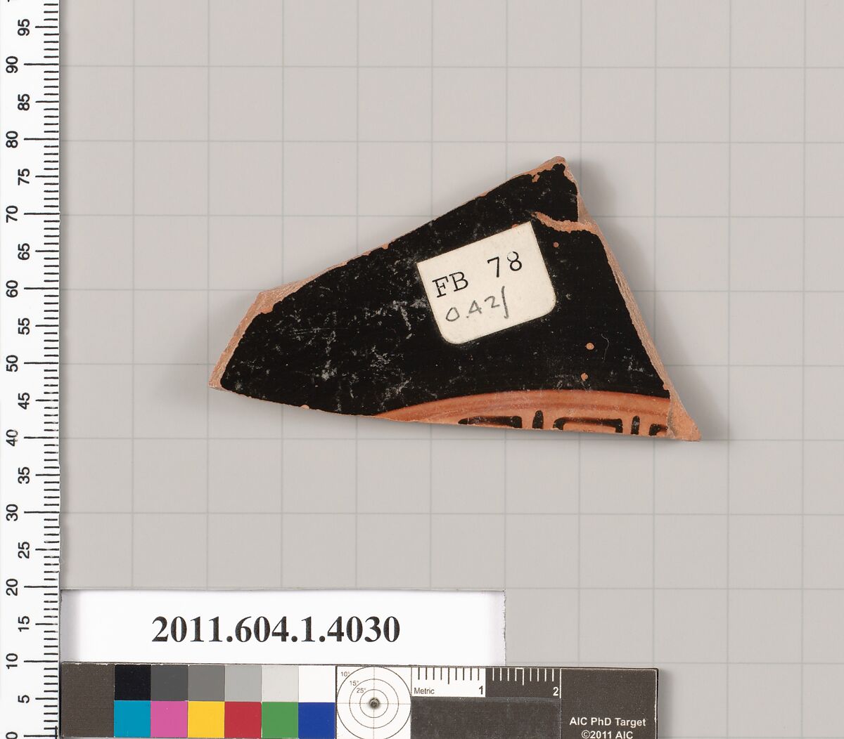 Terracotta fragment of a kylix (drinking cup), Terracotta, Greek, Attic 