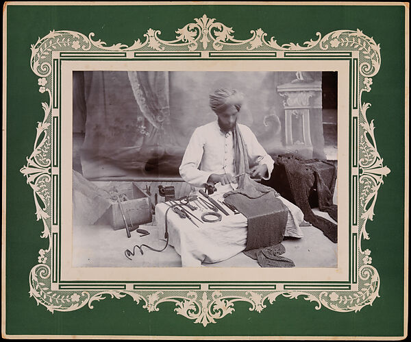 Suraj Uddin Mending Chain Mail, Jaipur, 1926, possibly by Gobindram and Oodeyram (Indian, Jaipur, active late 19th–mid-20th century), Probably gelatin silver print on mat board, Indian, Jaipur 