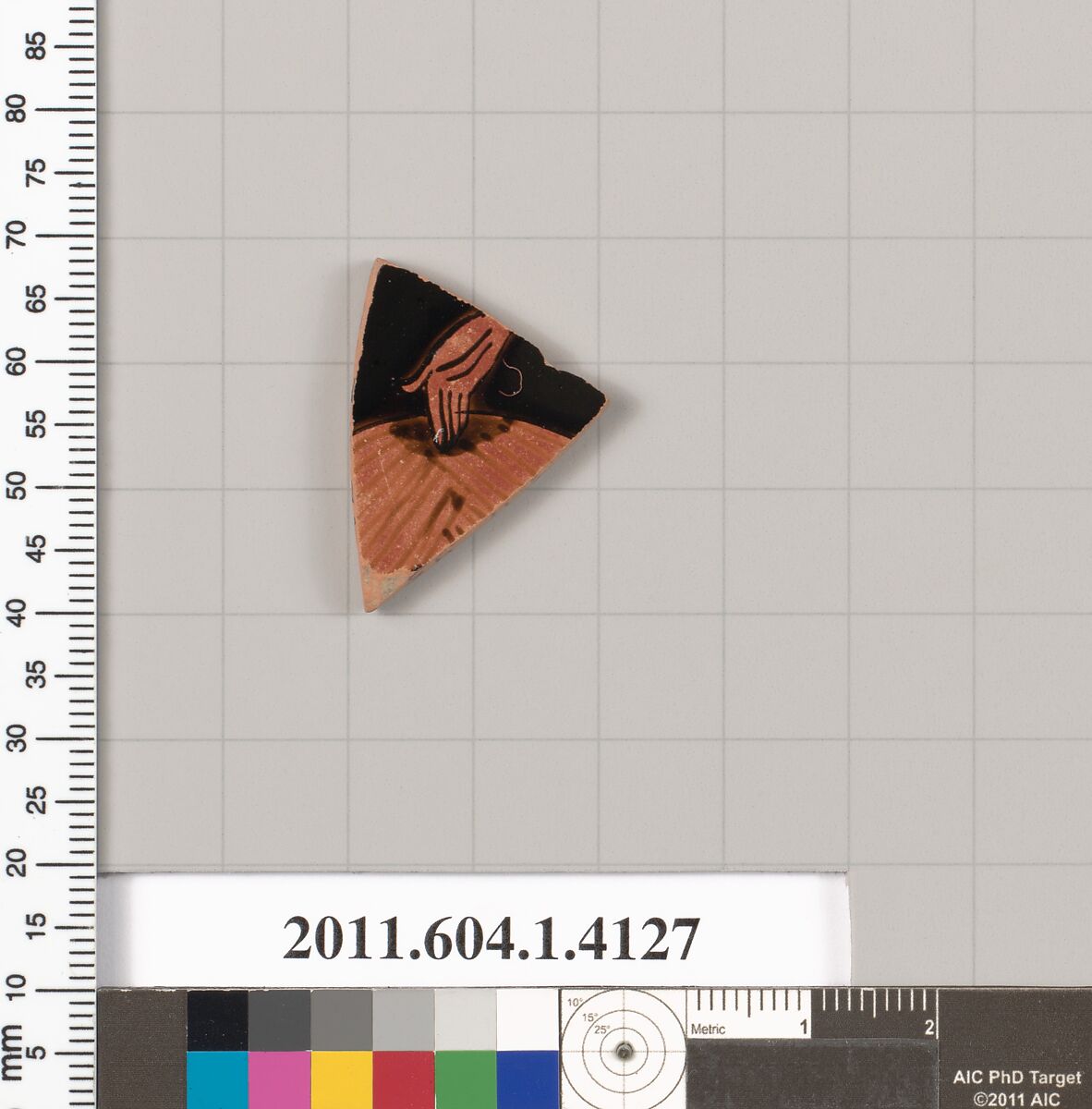 Terracotta fragment of a kylix (drinking cup), Terracotta, Greek, Attic 