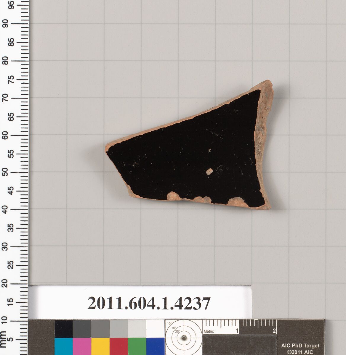 Terracotta fragment of a kylix (drinking cup), Terracotta, Greek, Attic