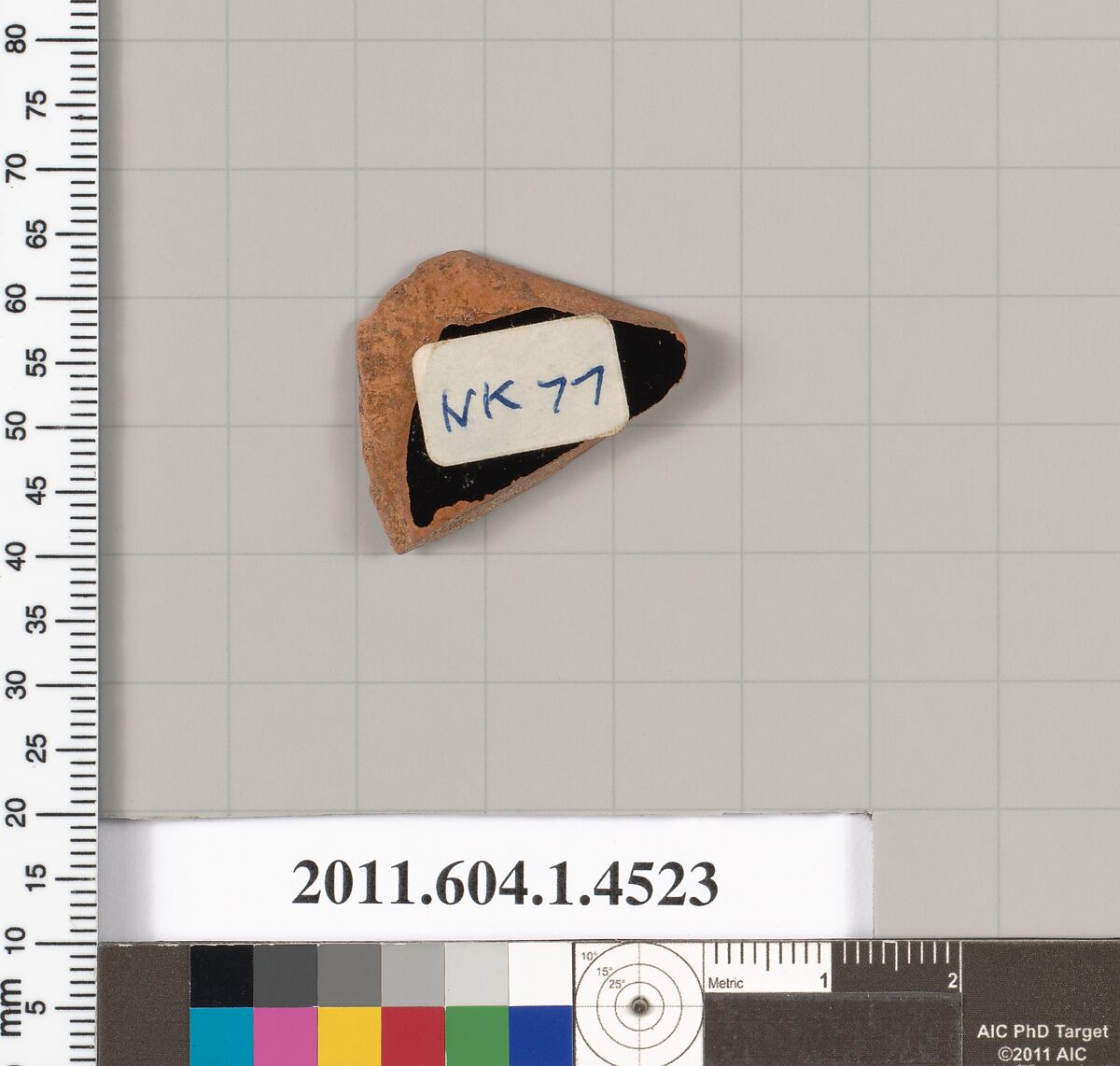 Terracotta fragment of a kylix (drinking cup), Terracotta, Greek, Attic