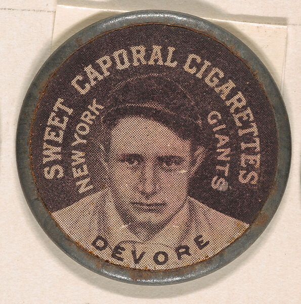 Devore, New York Giants (black), from the Domino Discs series (PX7), issued by Kinney Brothers, Issued by Kinney Brothers Tobacco Company, Commercial color lithograph with metal trim