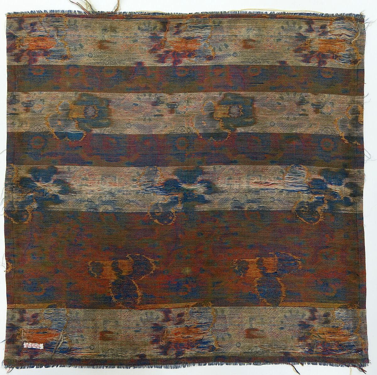 Textile fragment with floral scrolls and geometric pattern, Silk and metal thread lampas , China