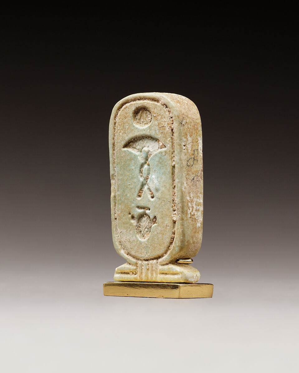 Cartouche-shaped plaque with the names of Apries, Faience