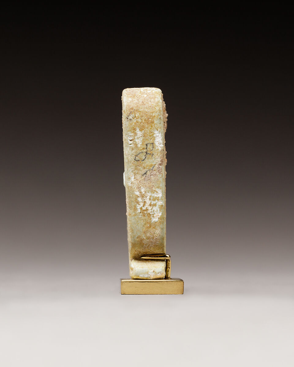 Cartouche-shaped plaque with the names of Apries, Faience