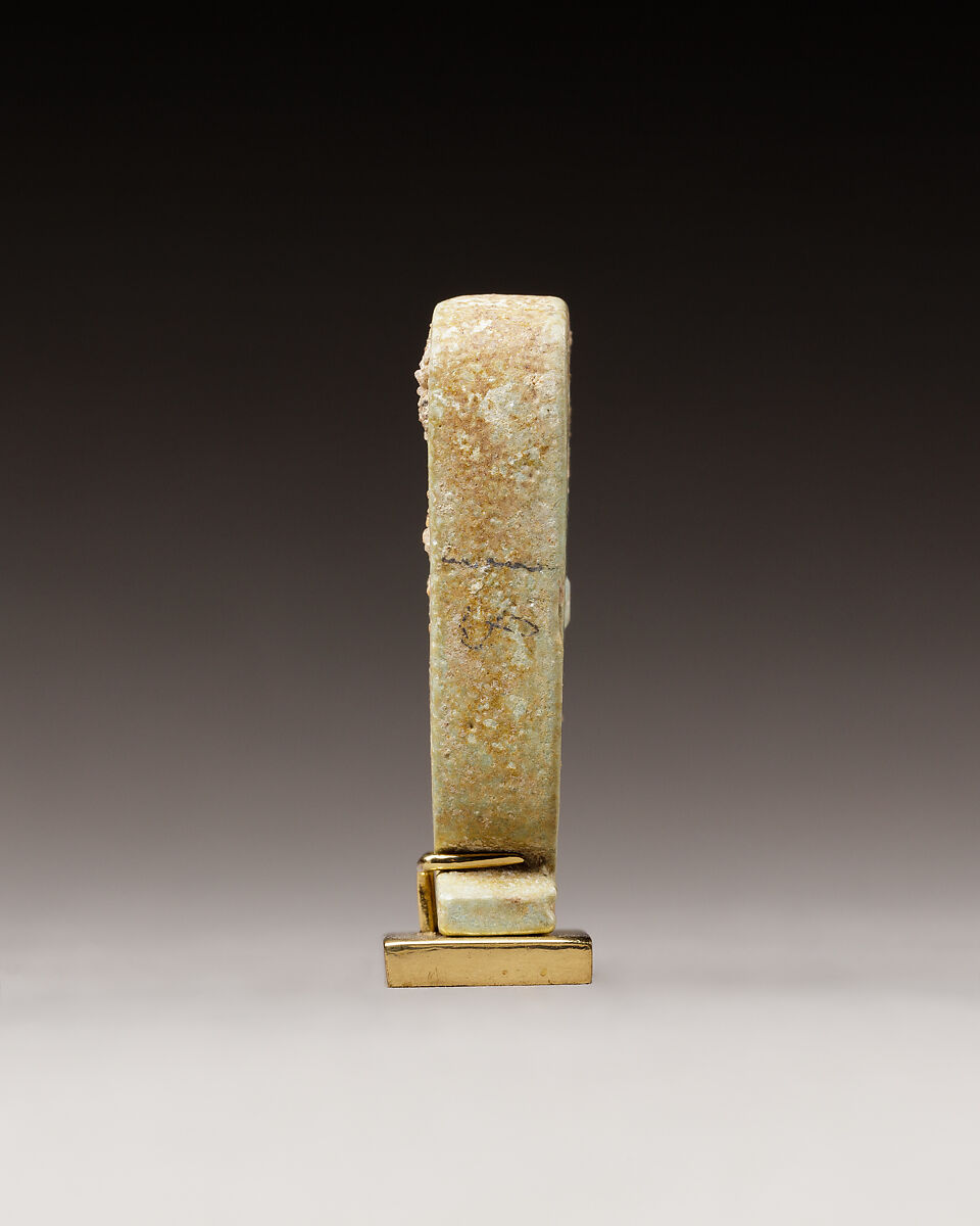 Cartouche-shaped plaque with the names of Apries, Faience