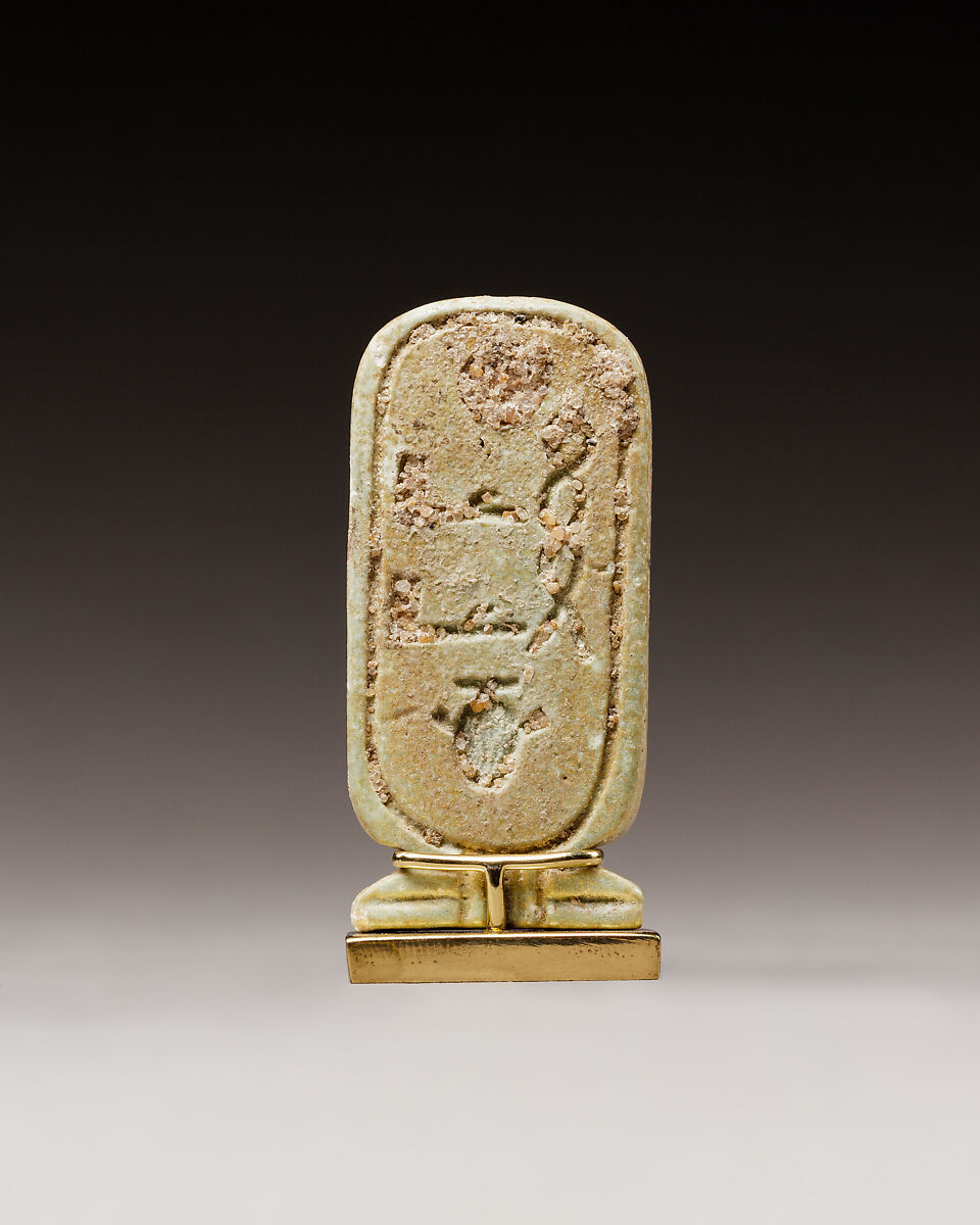 Cartouche-shaped plaque with the names of Apries, Faience