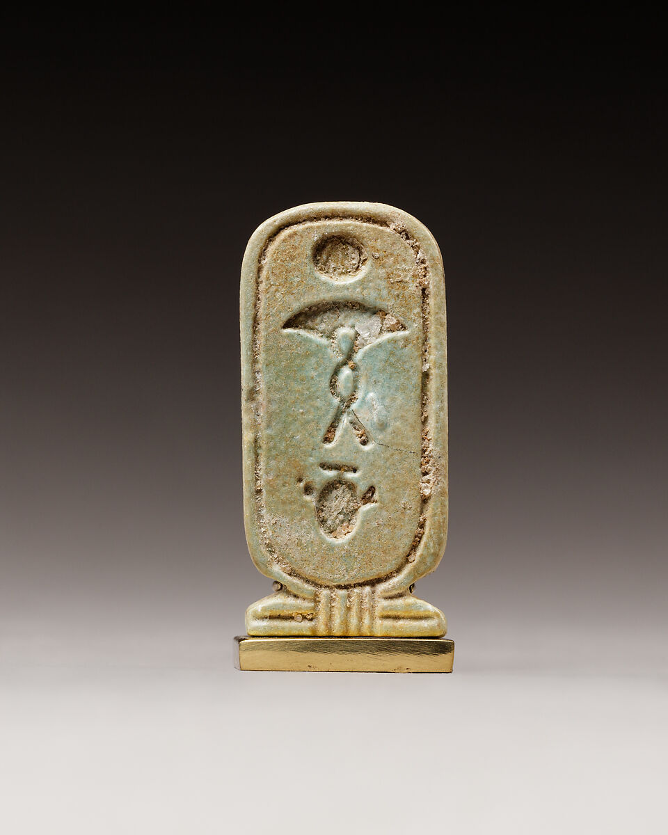 Cartouche-shaped plaque with the names of Apries, Faience 