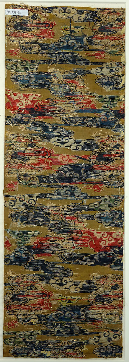 Textile fragment with dragon amidst clouds, Silk satin brocaded with silk and metal thread, China