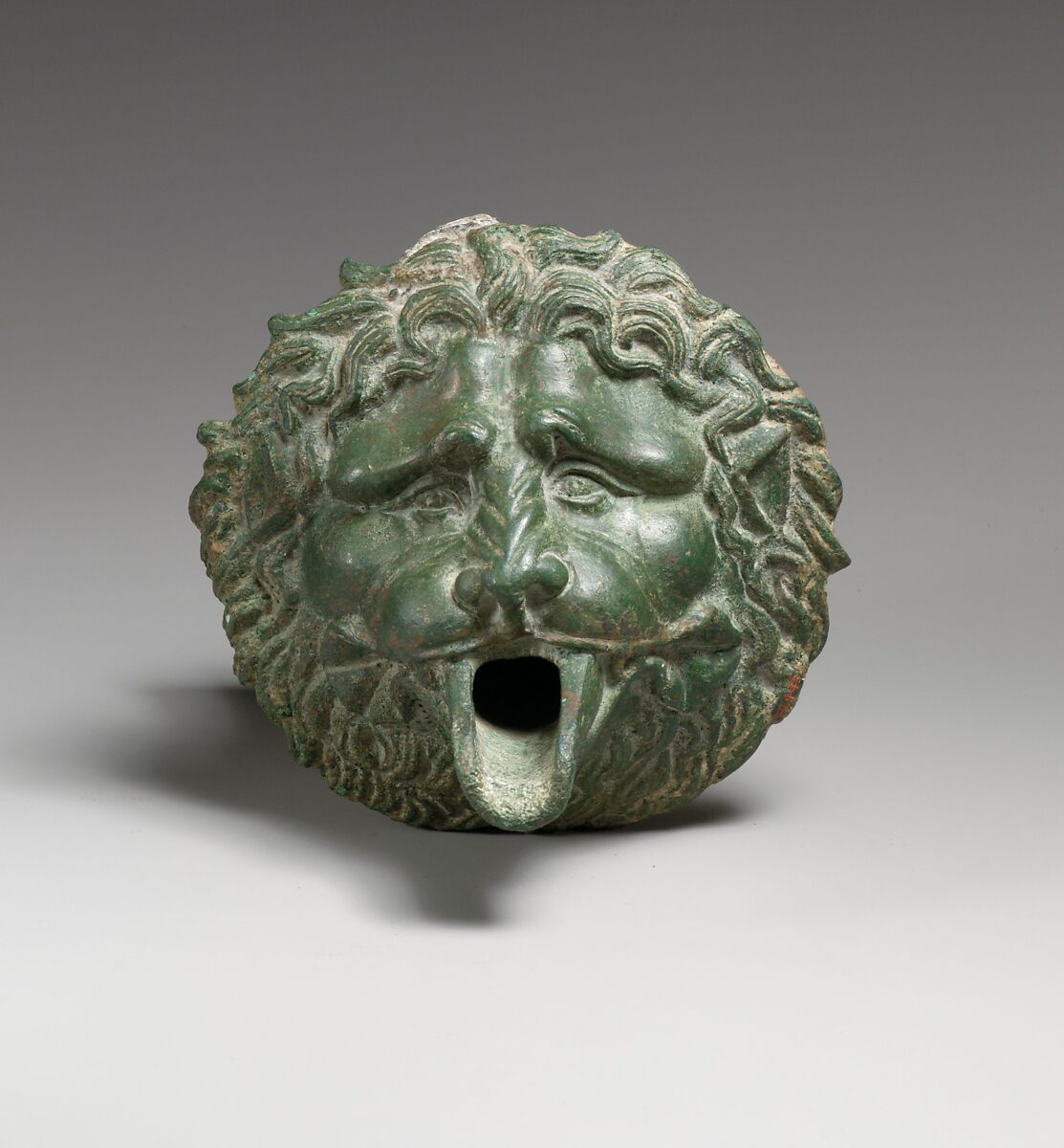 Bronze water spout in the form of a lion mask (one of a pair), Bronze, Greek or Roman 