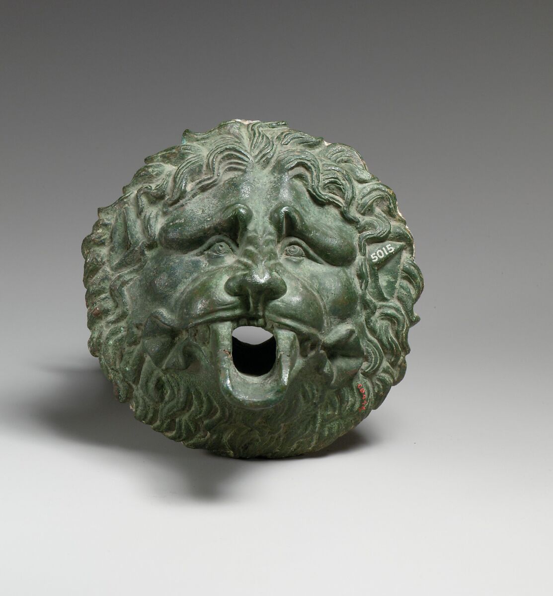 Bronze water spout in the form of a lion mask (one of a pair), Bronze, Greek or Roman