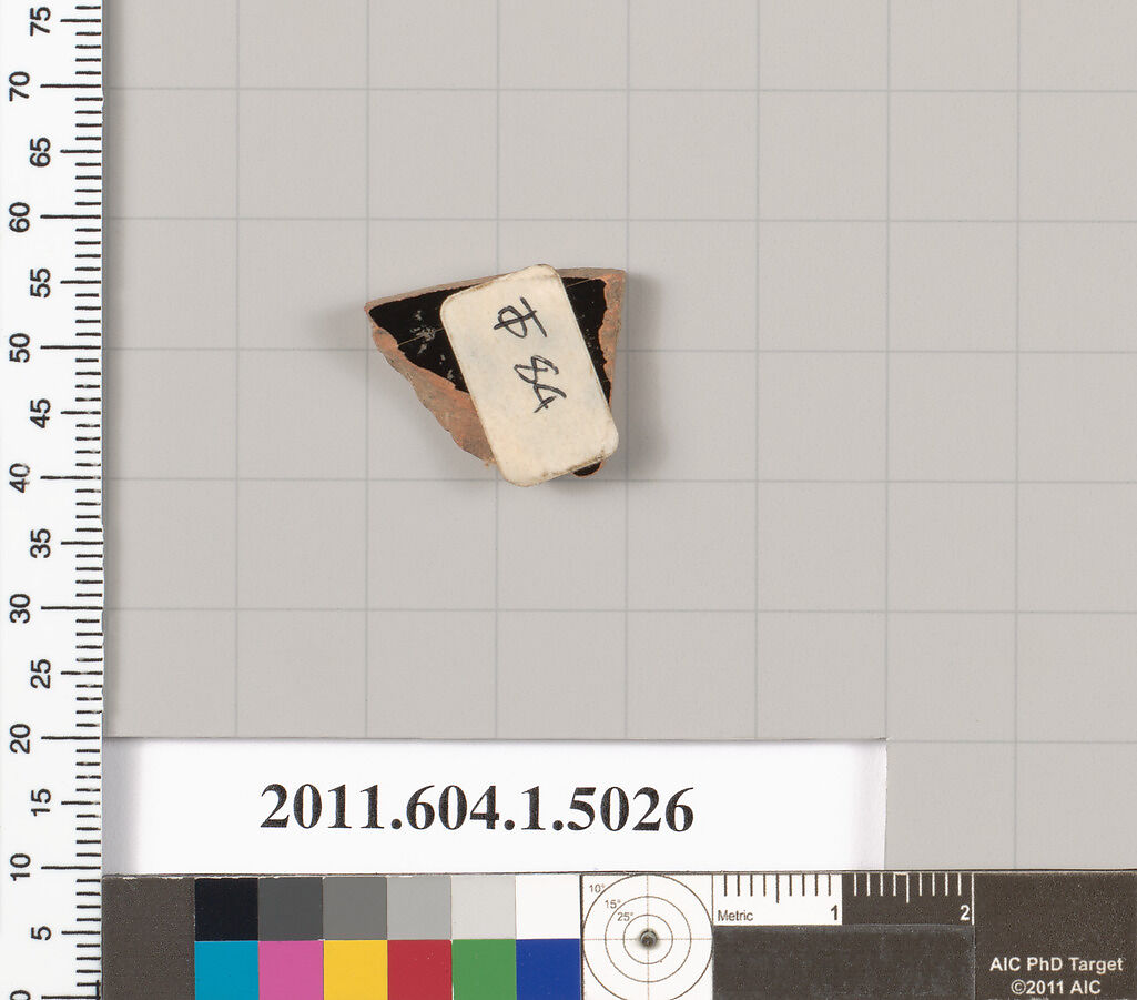 Terracotta fragment of a kylix (drinking cup), Terracotta, Greek, Attic