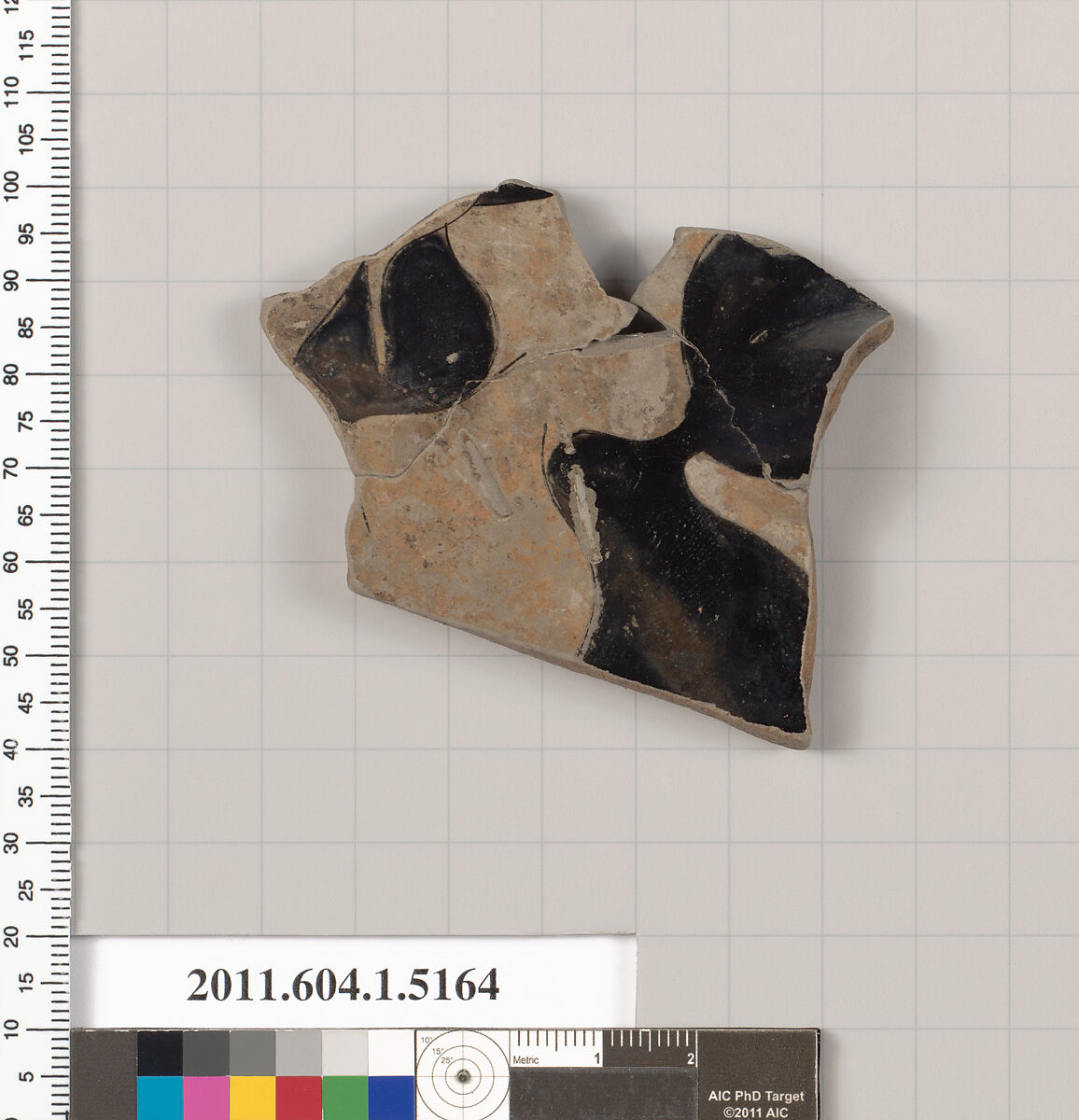 Terracotta fragment of a kylix (drinking cup), Terracotta, Greek, Attic