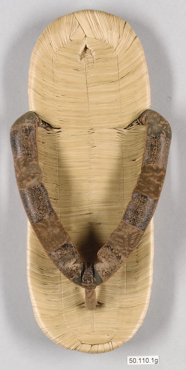 Costume of a Japanese Gentleman, (a) Silk,metalic thread / Plain weave
(b) Silk / Plain weave
(c) Silk / Plain weave
(d) Cotton; Silk / Plain weave
(e) Silk / Plain weave
(f) Silk / Braided
(g) Straw, leather / Woven
(h) Straw, leather / Woven
(i) Rush; leather; silk; wood / Woven
(j) Rush; leather; silk; wood / Woven
(k) Cotton / Knit
(l) Cotton / Knit, Japan