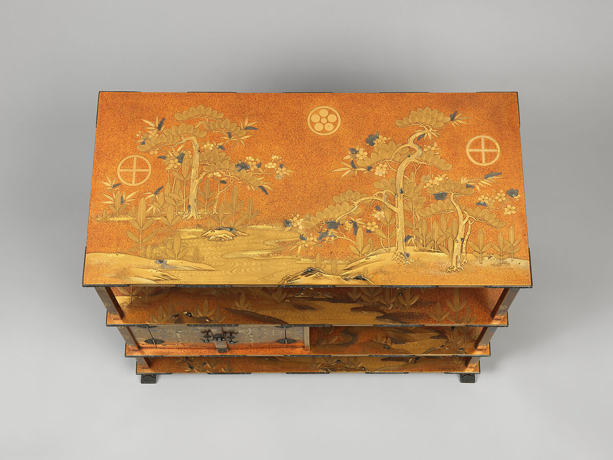 Shelf for Cosmetic Boxes (Kuro-dana) with Pine, Bamboo, Cherry Blossoms, and Crests of the Matsudaira and Shimazu Families, Lacquered wood with gold and silver takamaki-e, hiramaki-e, and togidashimaki-e, and cutout gold- and silver-foil application on gold nashiji (“pear-skin”) ground	, Japan
