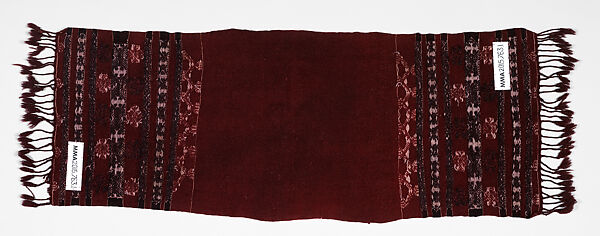 Bakhnug Shawl, Loom-woven plain weave cloth in wool with fine geometric pattern brocaded possibly in cotton; finished with warp-twisted fringes.