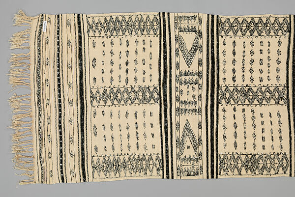 Bakhnug Shawl, Loom-woven plain weave cloth in wool with fine geometric pattern brocaded possibly in cotton; finished with warp-twisted fringes