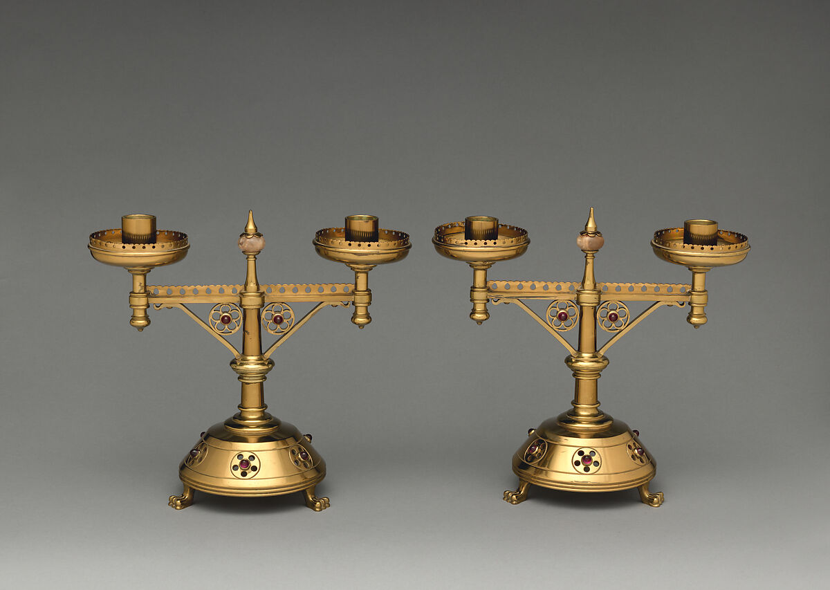 Candlestick (one of a pair), Bruce J. Talbert (British, Dundee, Scotland 1838–1881 London), Wrought brass, inset with cabochons and quartz, British