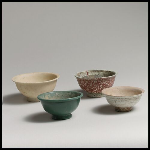 Four monochrome bowls
