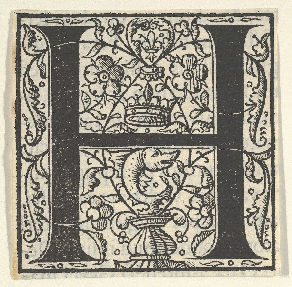 Initial letter H with dolphin and crown (related to King Francis I), Woodcut 