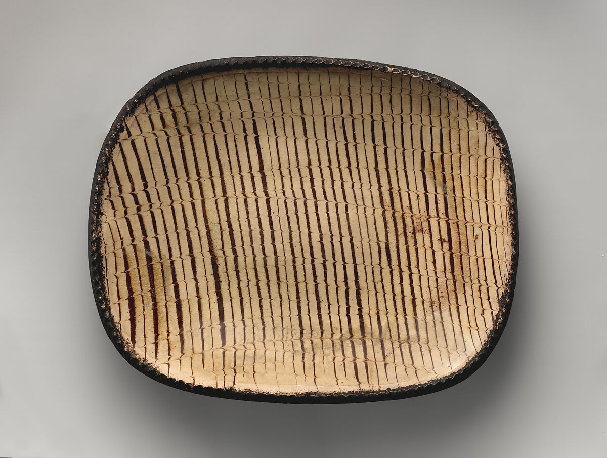 Dish, Earthenware decorated with colored slips, British 