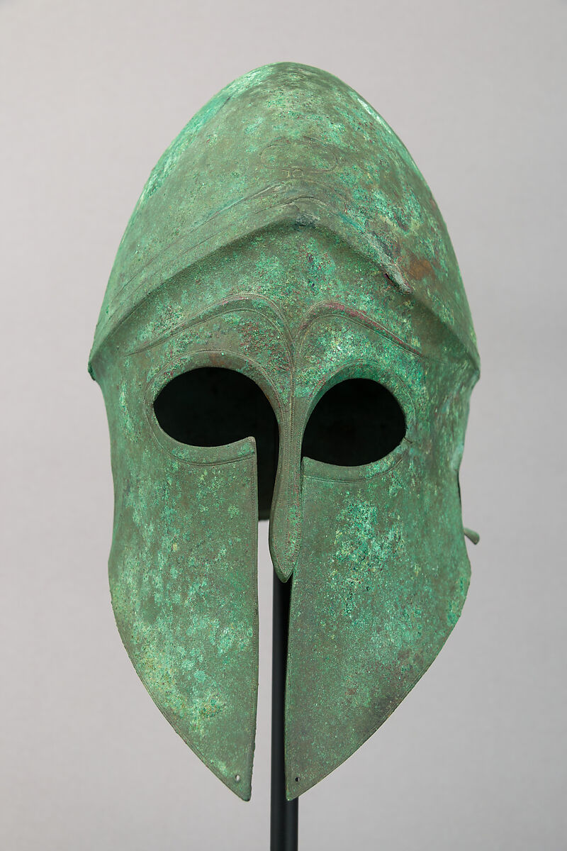 Helmet of the Corinthian Type and Pair of Greaves, Bronze, Greek